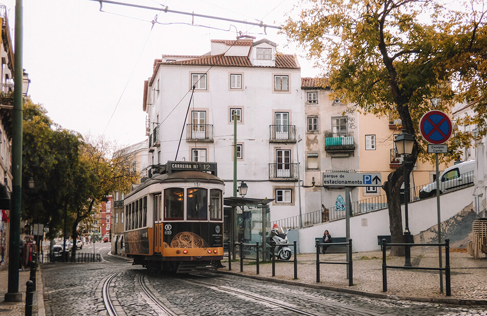 Riding the yelow trams around the Alfama neighbourhood in Lisbon