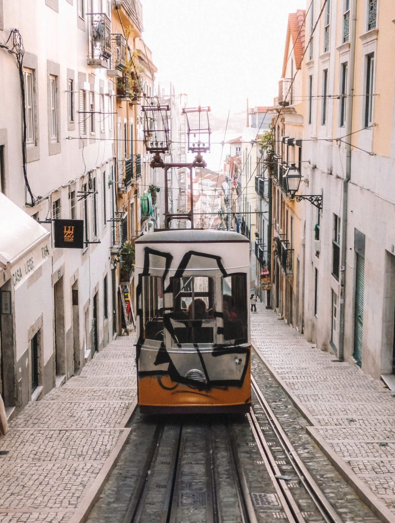 The cute yellow Elevador da Bica