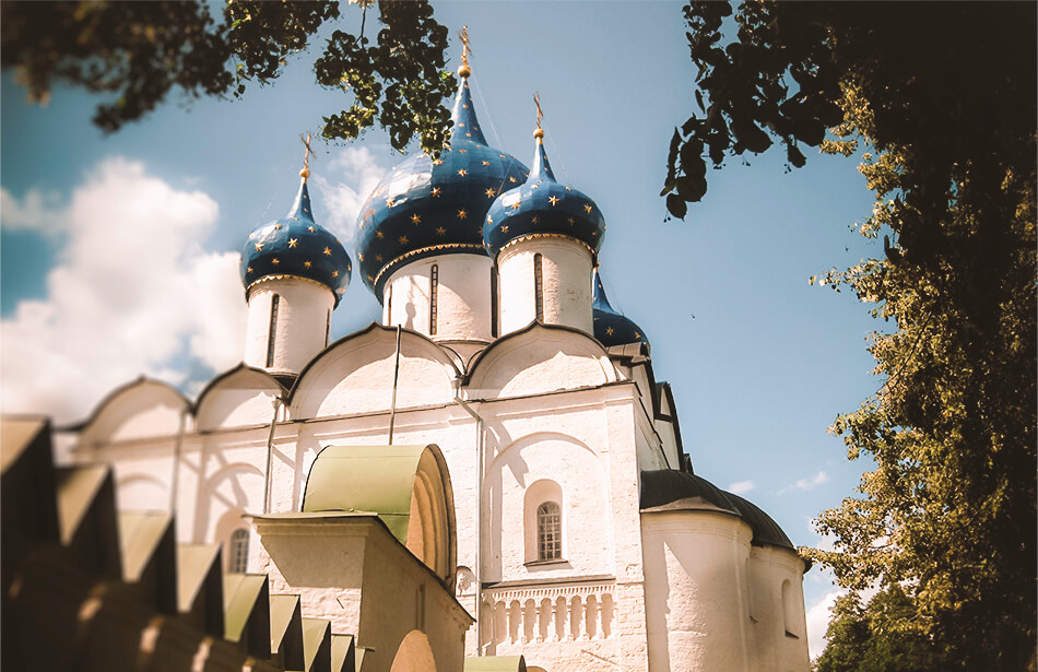 The blue and golden starred domes of the Kremlin in Suzdal, one of the ancient Russian capitals in the Golden Ring