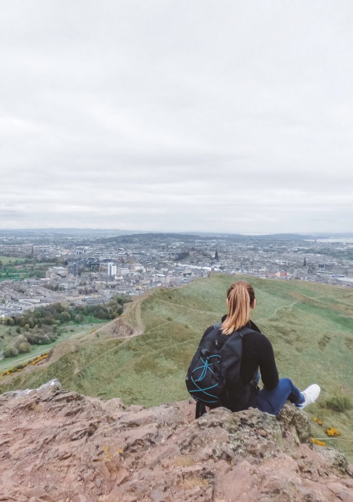 Enjoying the view over Edinburgh at the top of Arthur's Seat