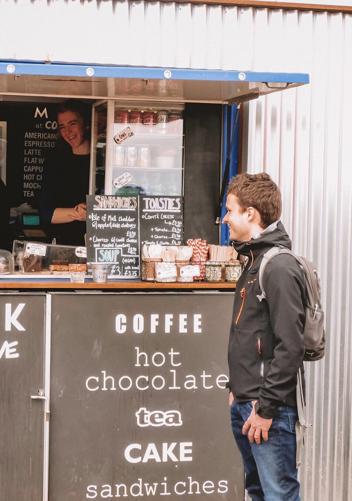 Enjoying some hot cacao while walking through Edinburgh on our  self-guided walking tour