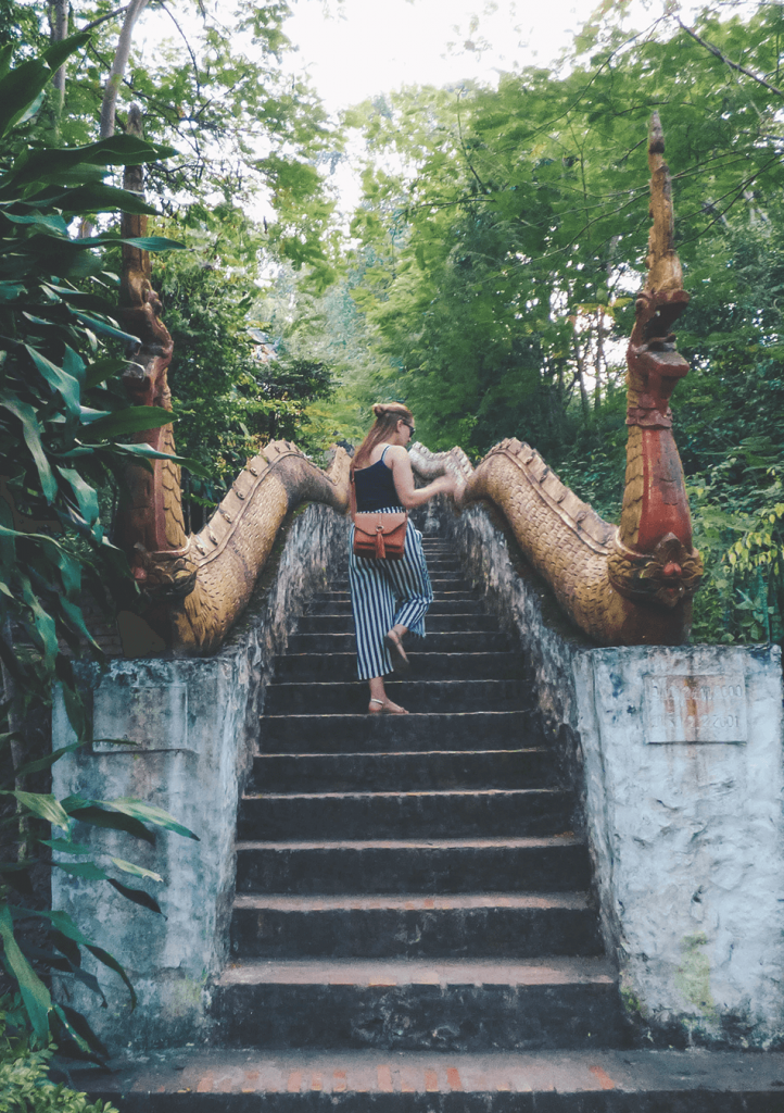 Climbing the steps of Phousi Hill in Luang Prabang, Laos