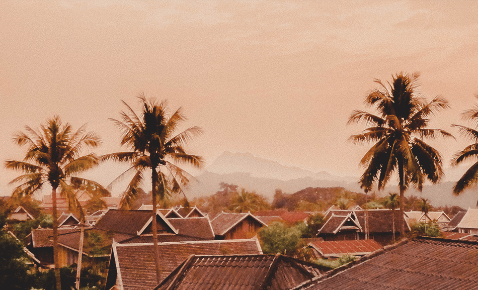 Sunsets turning the Luang Prabang rooftops pink