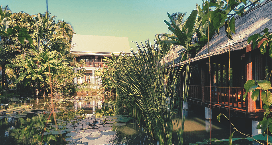 Over the water bungalows at Maison Dalabua, an affordable boutique hotel in Luang Prabang, Laos