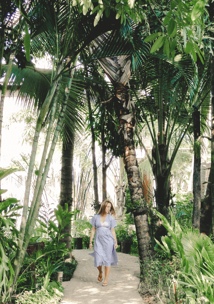 Wandering through the lush gardens of Maison Dalabua in Luang Prabang, Laos