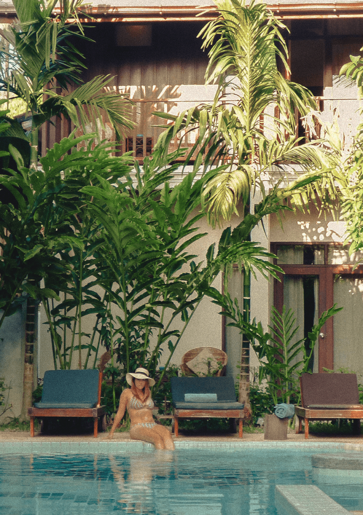 Lounging at the refreshing pool of Maison Dalabua, a serene boutique hotel in Luang Prabang, Laos