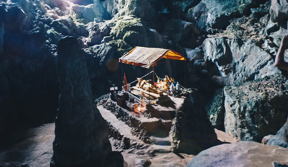 Deep into the Tham Phu Kham Cave, you can find a gold buddha