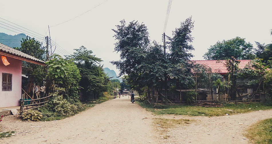 Motorbiking through local villages in Vang Vieng