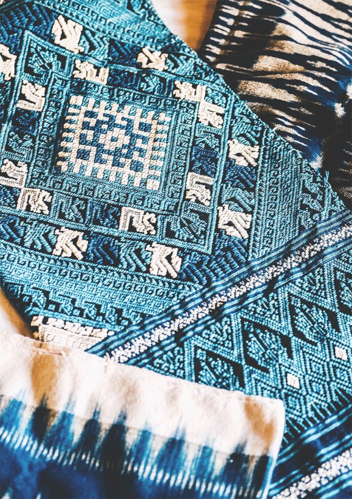 Handmade fabrics painted in indigo colours for sale in Luang Prabang, Laos