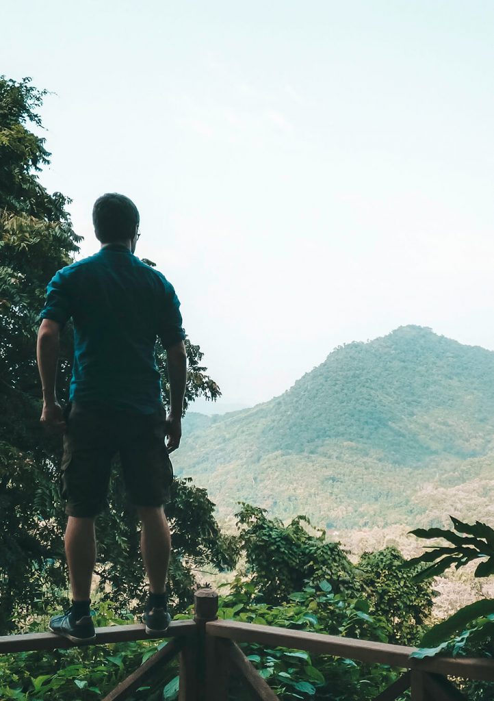 View from the top of Kuang-Si Falls over the surrounding jungle