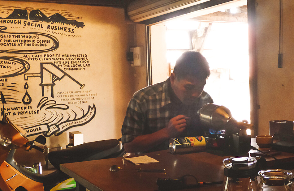 Testing the arabiata coffee at Jhai Coffe shop, the Bolaven Plateau