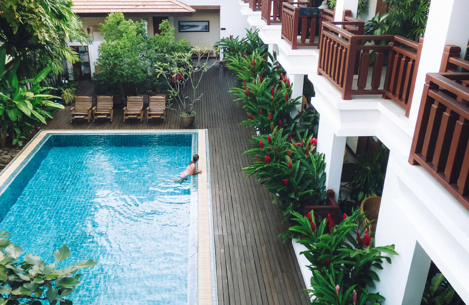 Washing off the dirt and heat in the pool of Athena Hotel Pakse