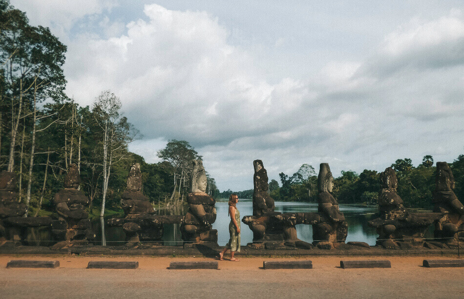 Statues ligning the gates of Bayon in Angkor Wat, Cambodia