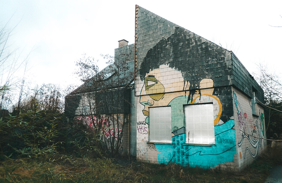 The walls of abandoned homes are used as canvases by different artists