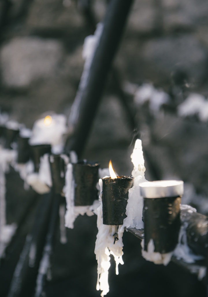 Candles buring at the top of Cerro San Cristóbal