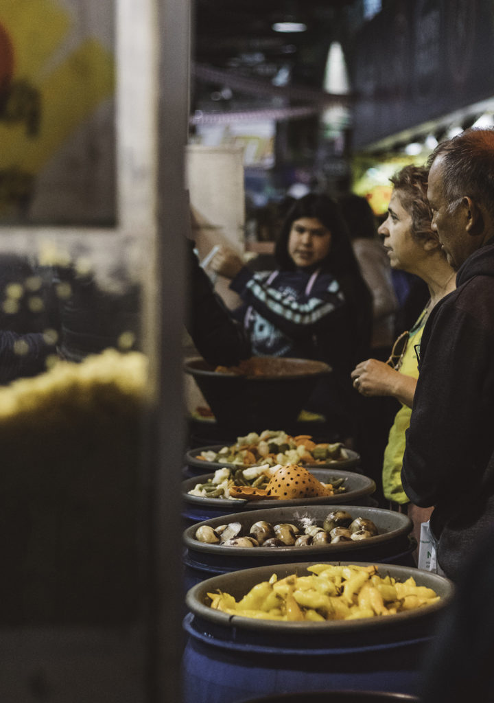 Freshly prepared dishes in La Vega market