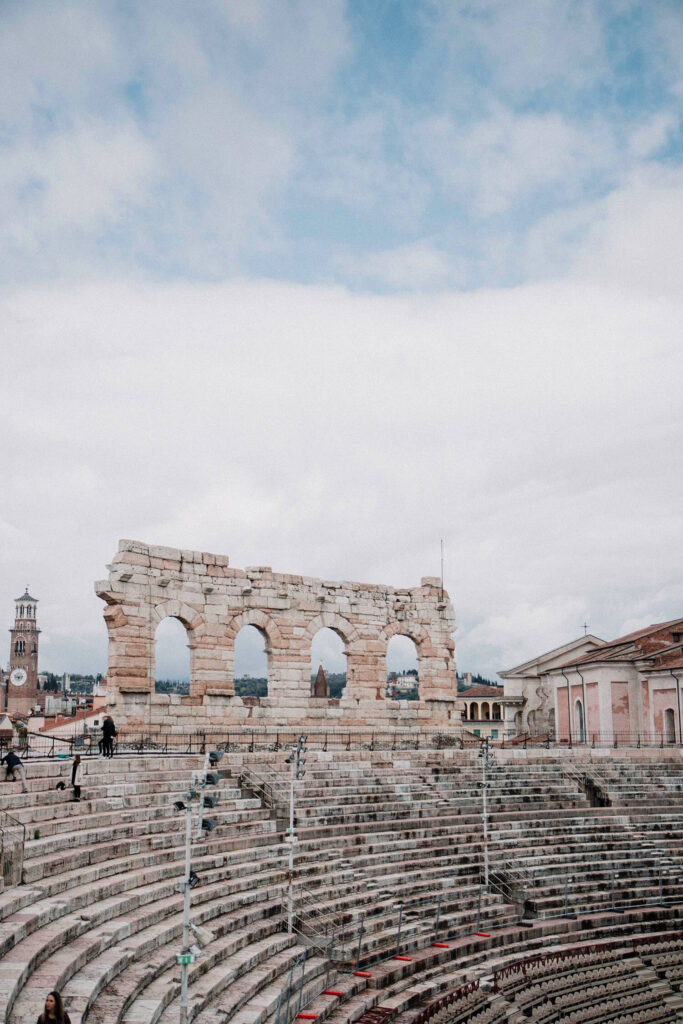 Inside the Verona Arena admiring remnants of the outer arena wall