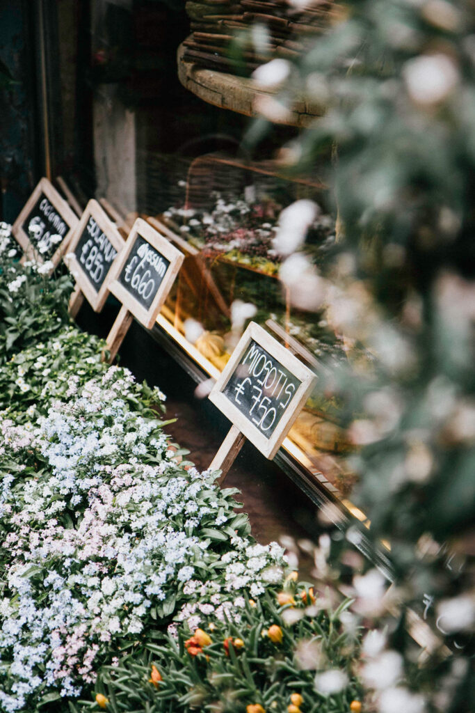 Flowers at a flower market in front of Ponte Pietra