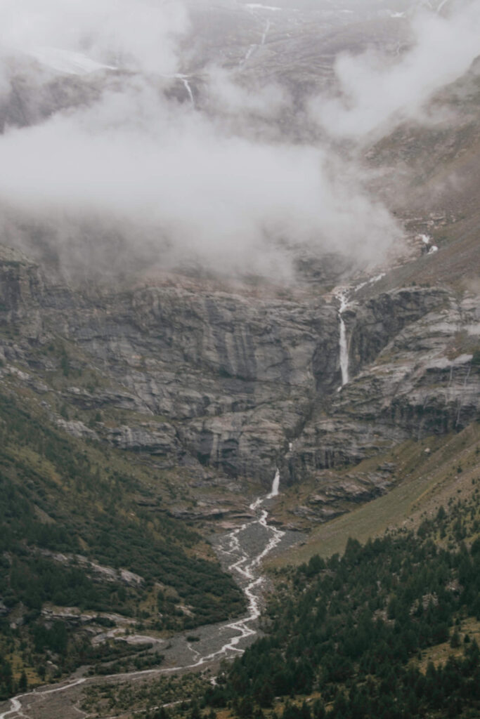 Waterfalls in Swiss Alps as seen from the Bernina Express