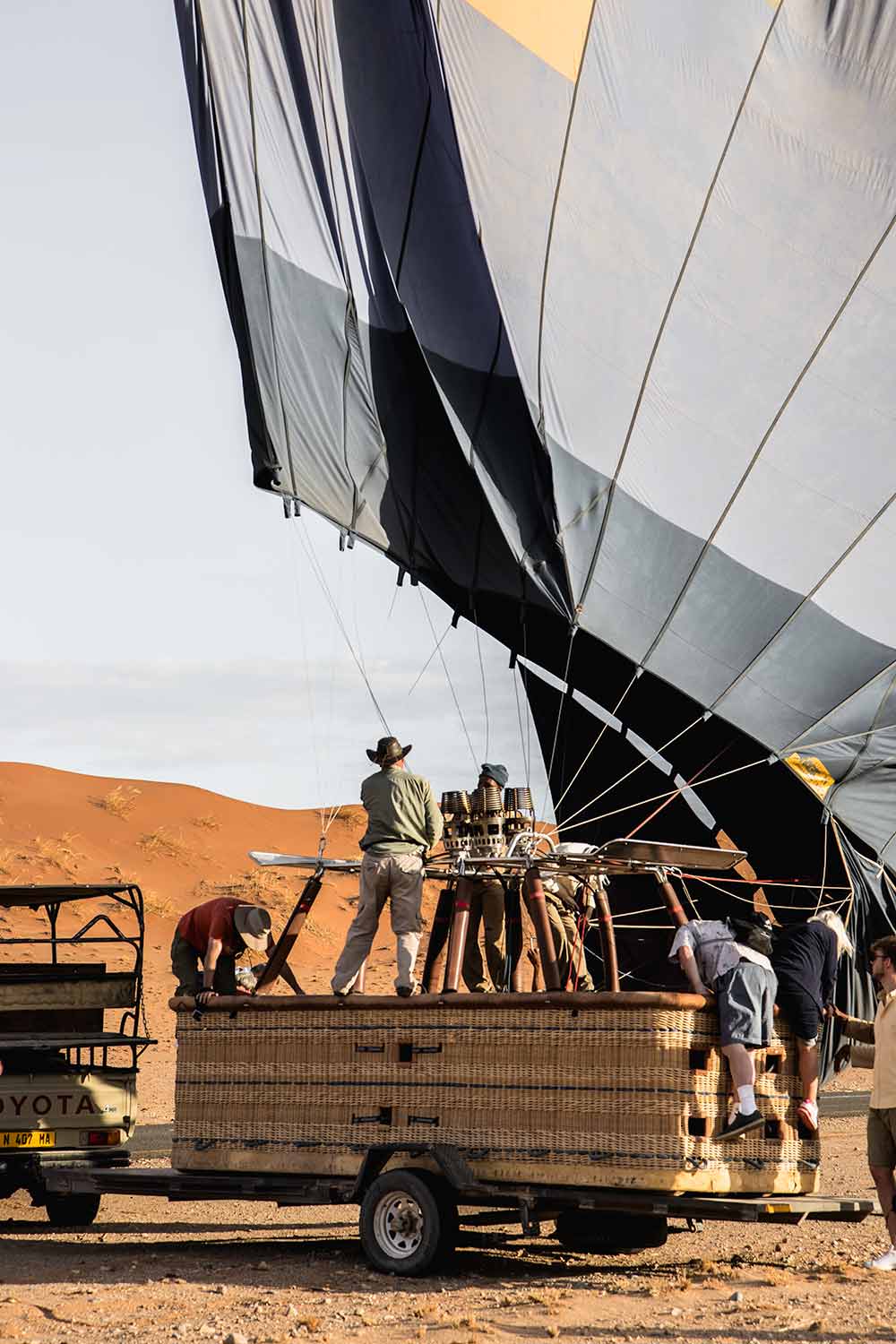 Packing up the air balloon after enjoying a one hour scenic flight over the Sossusvlei dunes.