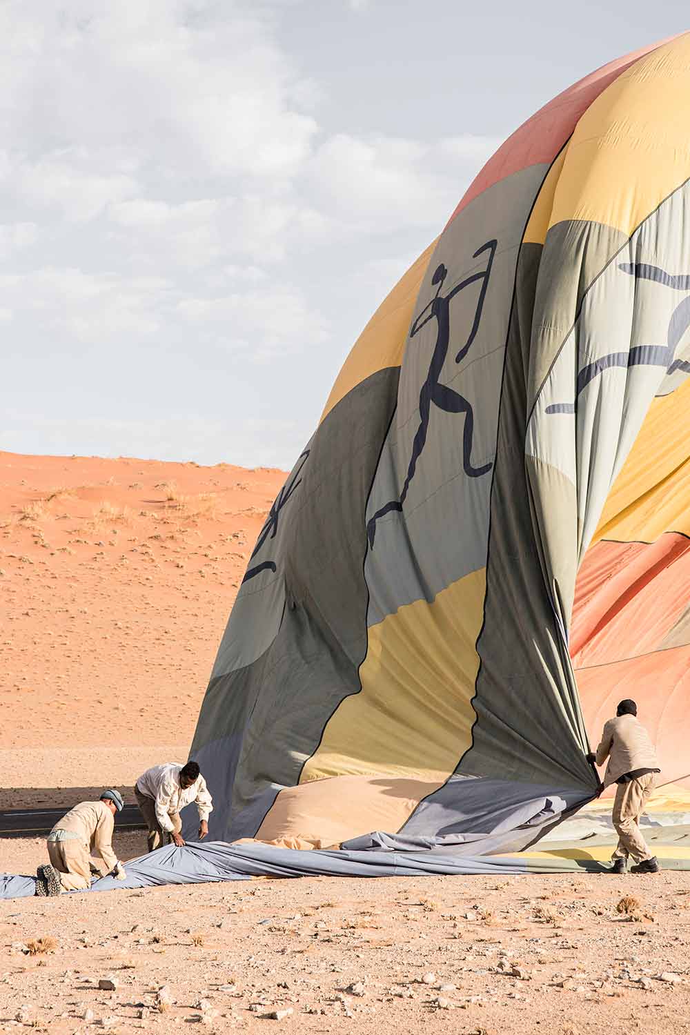 Packing up the air balloon after enjoying a one hour scenic flight over the Sossusvlei dunes.