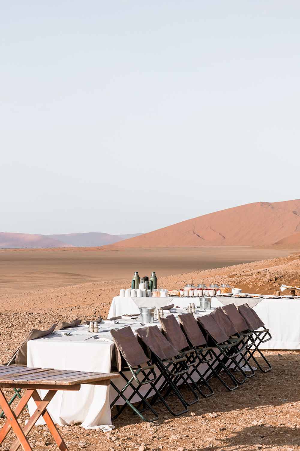 A romantic breakfast spread among the Namib dunes at the end of our Sossusvlei hot air balloon ride