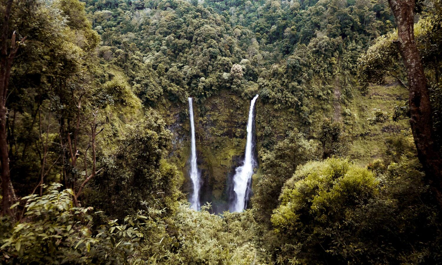 Tropical waterfalls peppered around the volcanic landscape of the Bolaven Plateau