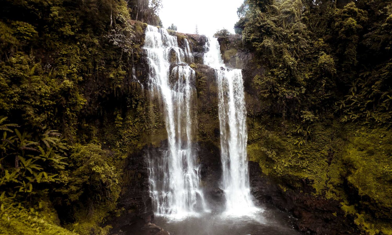 View of the gorgeous Tad Yuang Falls while drive the small Bolaven Plateau Loop