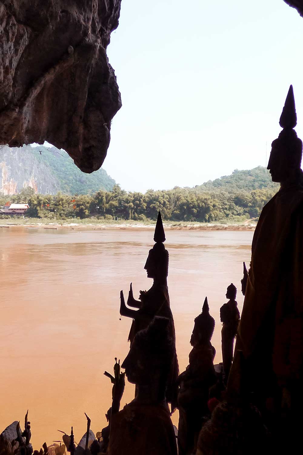Orange colors of the Mighty Mekong River at Pak Ou Caves