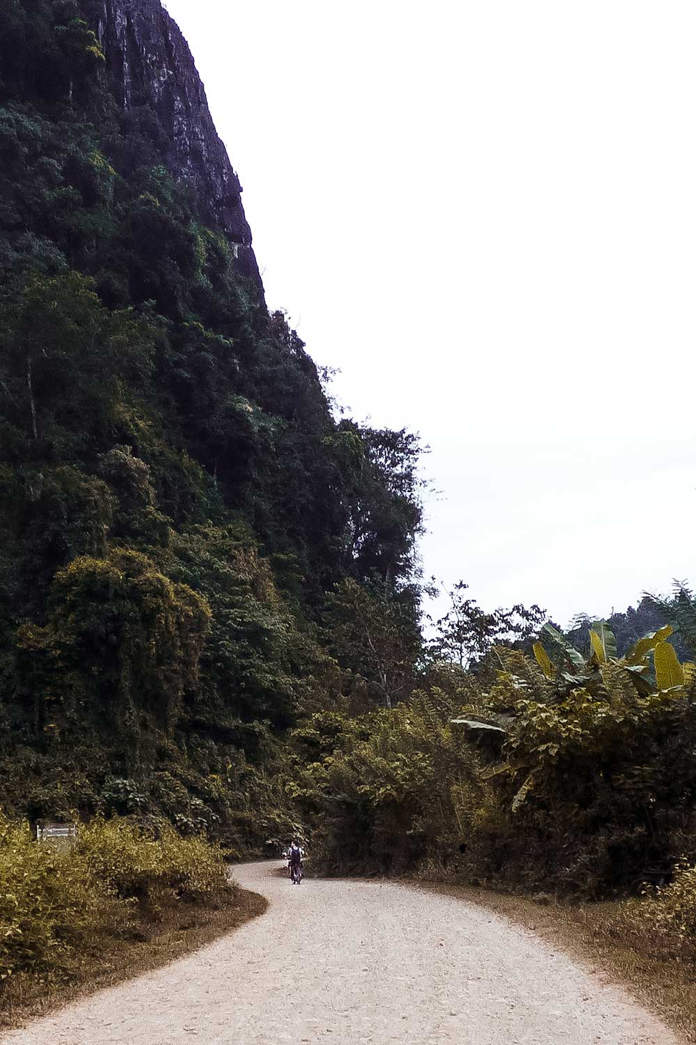 Feeling incredibly small when riding past Vang Vieng's limestone mountains