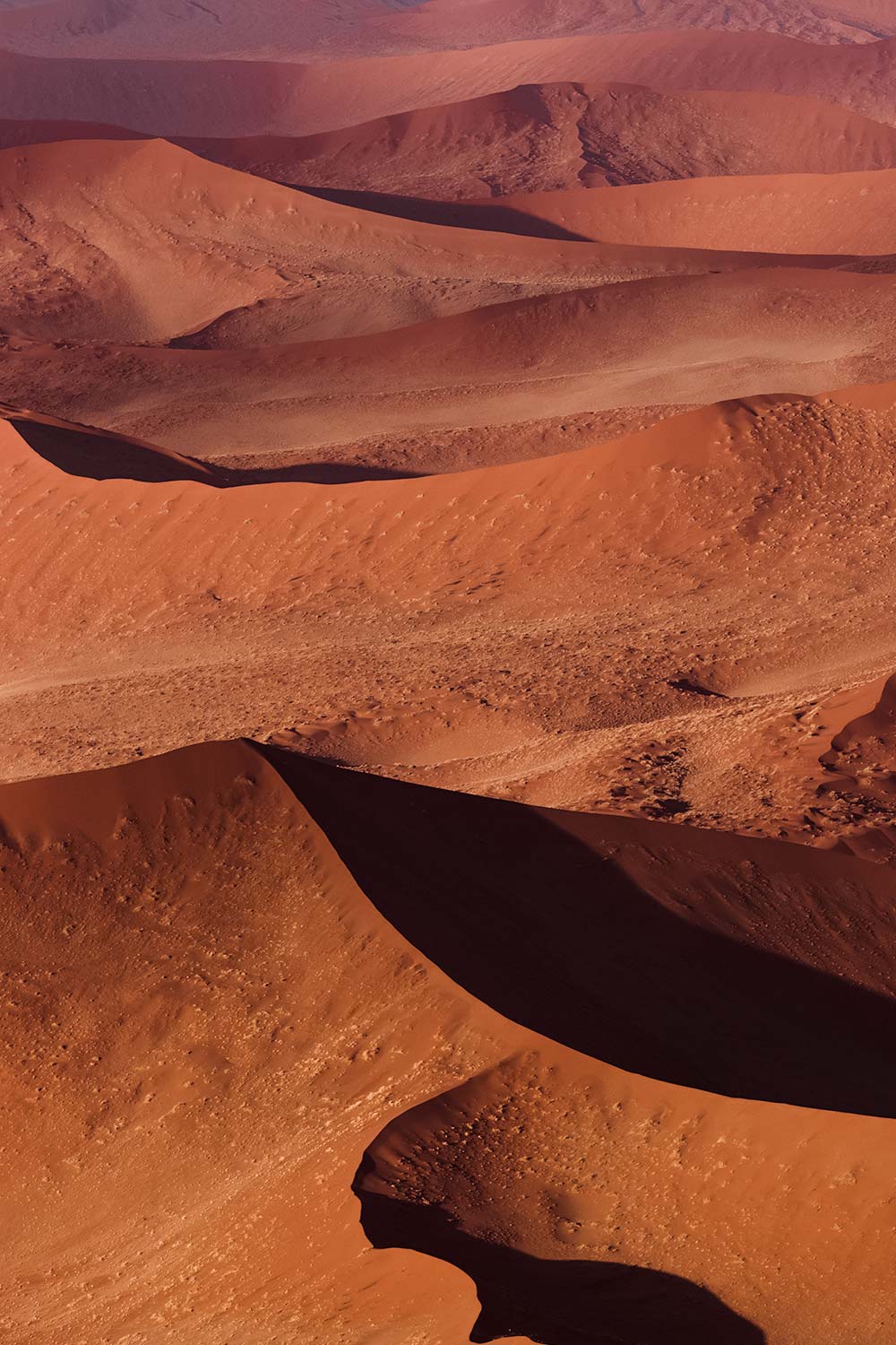 The most romantic of all Sossusvlei activities is admiring the abstract sand shapes of the dunes below.